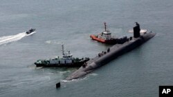 Атомная подводная лодка USS Michigan на военно-морской базе в Пусане, Южная Корея, 16 июня 2023 года.