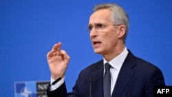 Tổng thư ký NATO Jens Stoltenberg tại cuộc họp báo ở Brussels vào ngày 14/2/2024. (Photo by JOHN THYS / AFP)